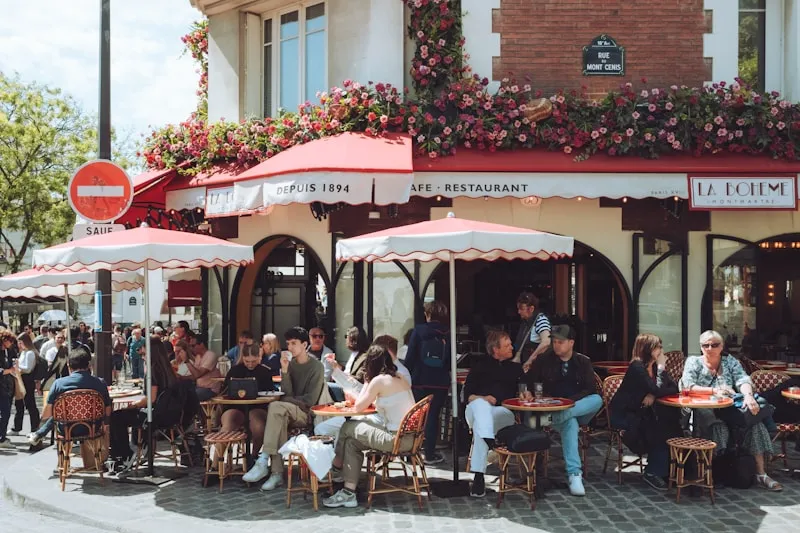 A flower-covered Parisian restaurant terrace