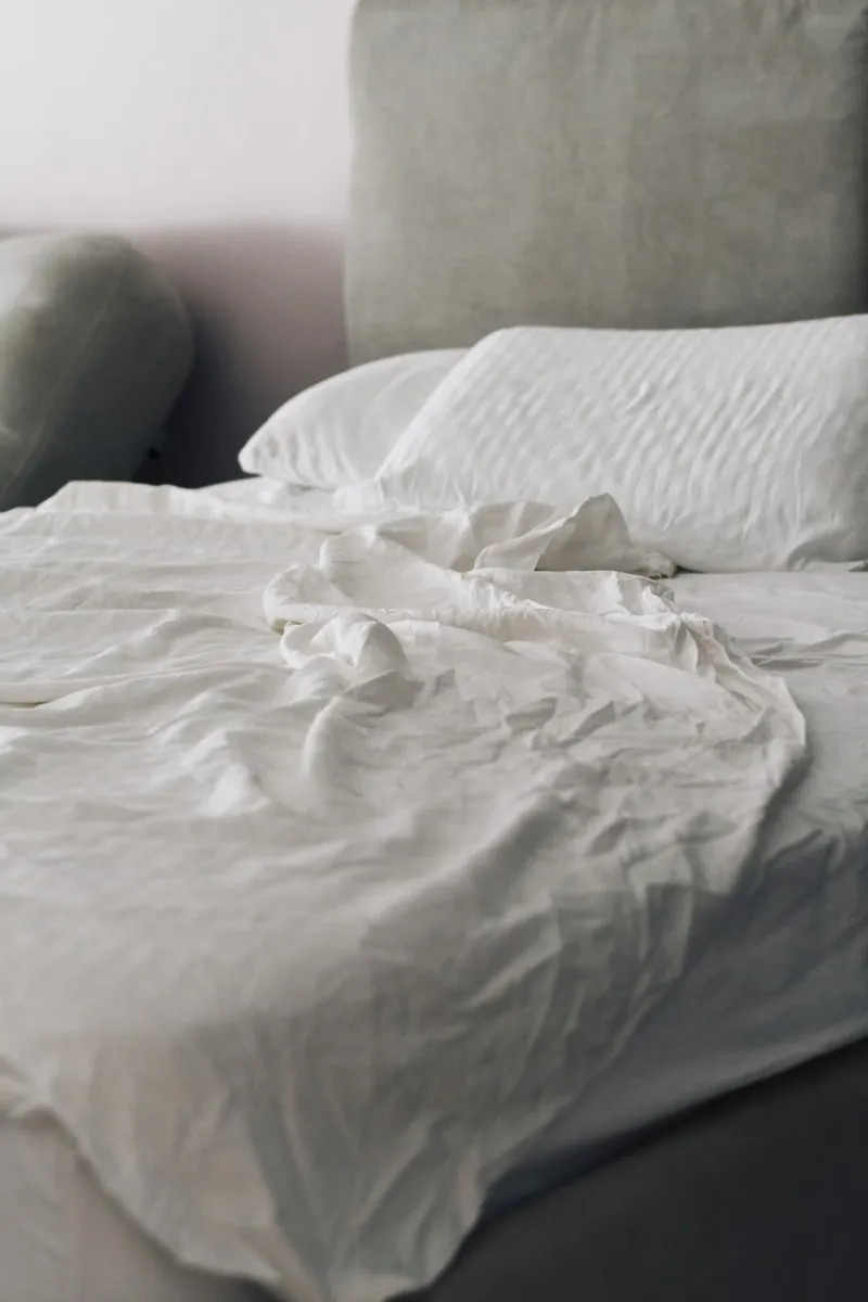 Crisp white hotel bed linen