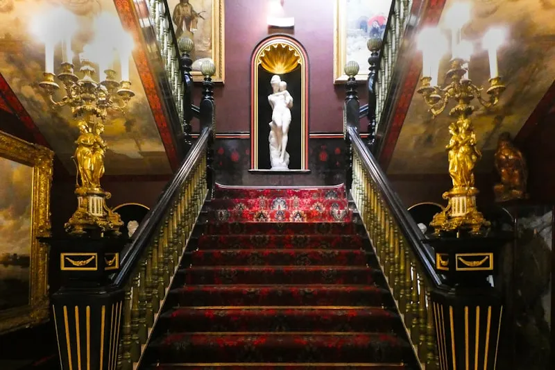 The grand staircase of a historic hotel